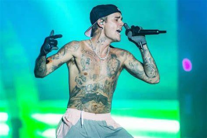 All of Me R&B singer who sold his music catalog in 2022: 2 wds.